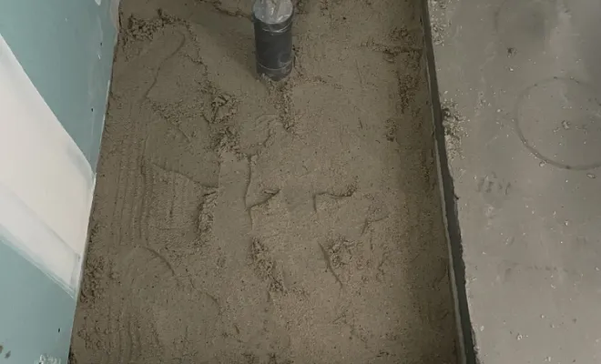 Maçonnage d'un bac à douche à l'italienne.