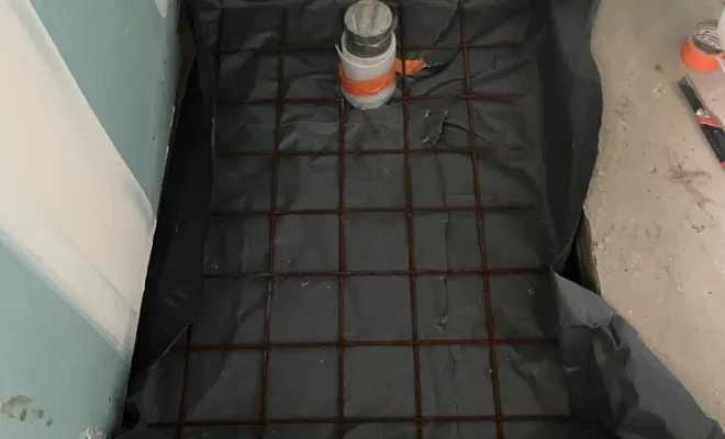 Maçonnage d'un bac à douche à l'italienne.