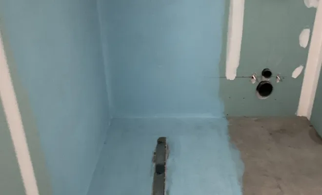 Maçonnage d'un bac à douche à l'italienne.