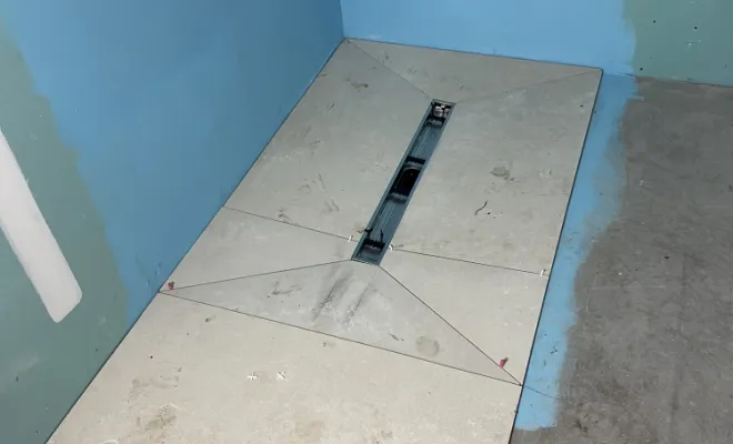 Maçonnage d'un bac à douche à l'italienne.