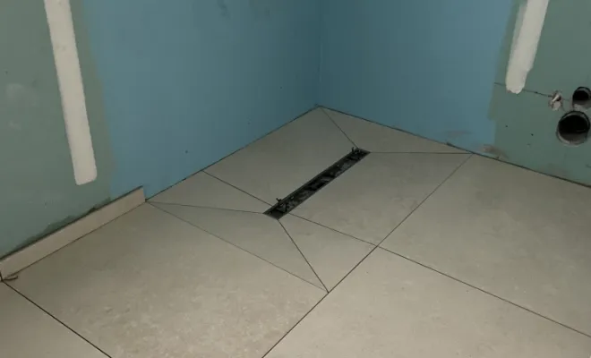 Maçonnage d'un bac à douche à l'italienne.