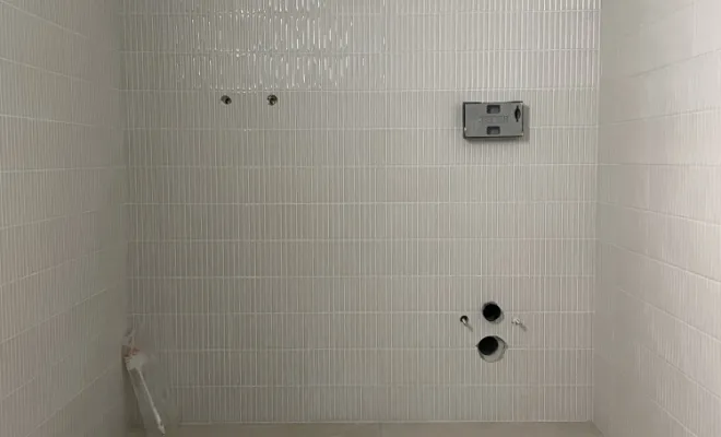 Maçonnage d'un bac à douche à l'italienne.